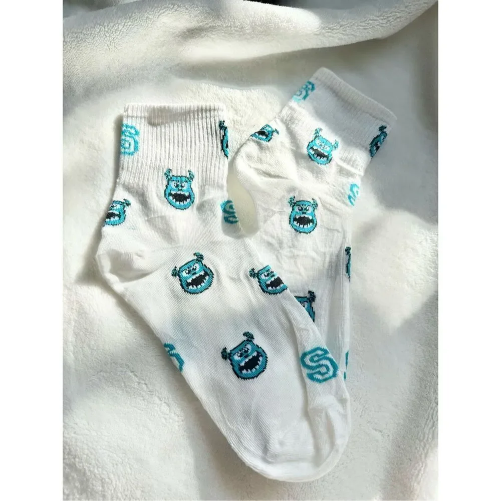 Disneys blue and white James P. Sullivan “Sully” from monsters Inc. socks